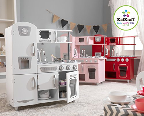 KidKraft 53179 - Cocina de juguete de madera vintage rosa para niños con teléfono incluido para juegos de dramatizaciòn , Color Rosa