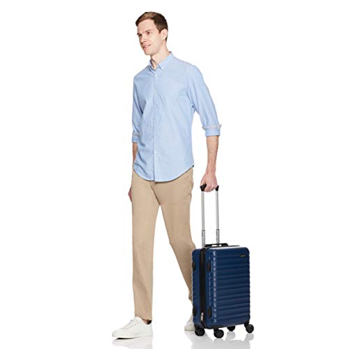 AmazonBasics - Maleta rígida con ruedas, 55 cm, tamaño para cabina, azul marino, apto para la mayoría de las aerolíneas de bajo coste