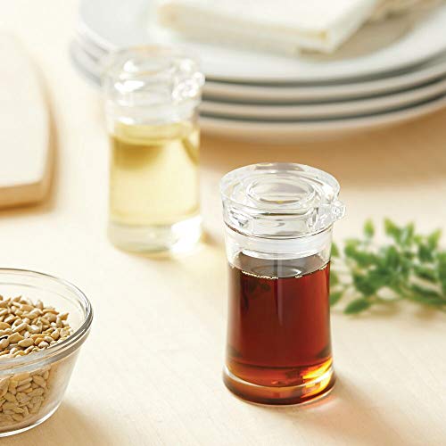 mDesign Juego de 2 aceiteras – Aceitera y vinagrera pequeñas de plástico, también para aderezos y más – Dosificadores de líquidos con tapa para cocina y comedor – transparente