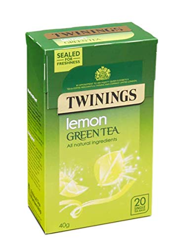 Infusión de té verde y limón con Steens MGO Raw sin pasteurizar Nueva Zelanda Manuka Miel, taza y cuchara