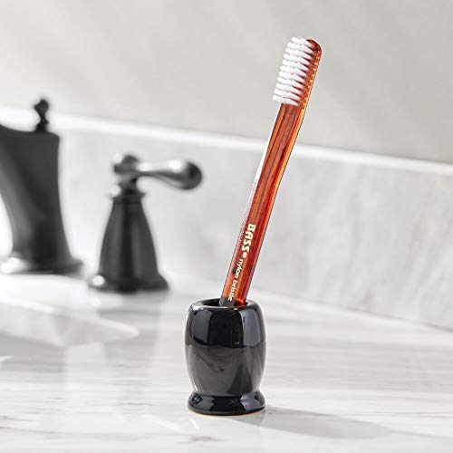 mDesign Juego de 4 vasos para cepillos de dientes modernos y compactos – Portacepillos de dientes redondos hechos de cerámica – Accesorios de baño de pie para lavabo o muebles con espejo – negro