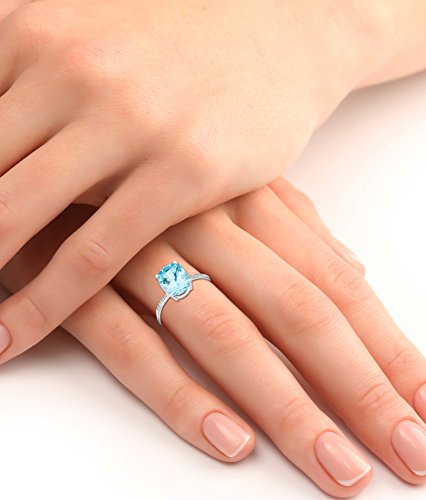 Miore mujer 9 k (375) oro blanco talla ovalada azul topacio diamante
