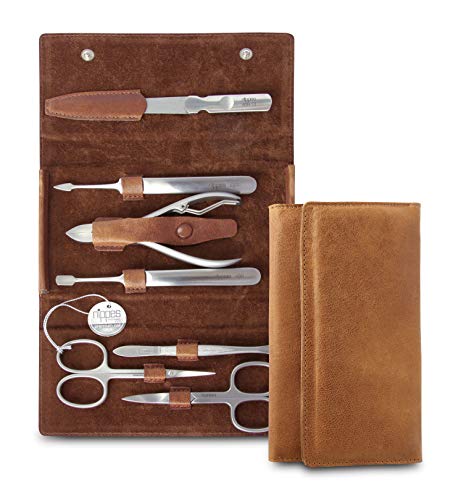 Nippes Solingen - Set de manicura (7 piezas, acero inoxidable y sin níquel, estuche de piel de vacuno con botón de presión, línea Nippes Premium), color marrón