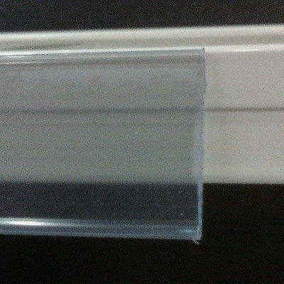 Pack de 50 portaprecios con adhesivo a 1 metro para etiquetas de 30mm . Color transparente.